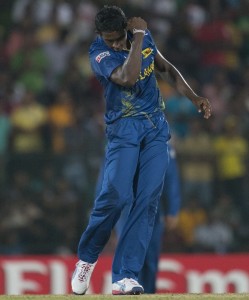 Sri Lanka's bowler Ajantha Mendis celebrates the dismissal of Zimbabwe's Graeme Cremer