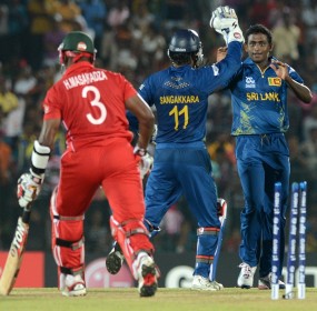 Ajantha Mendis celebrates the wicket of Hamilton Masakadza