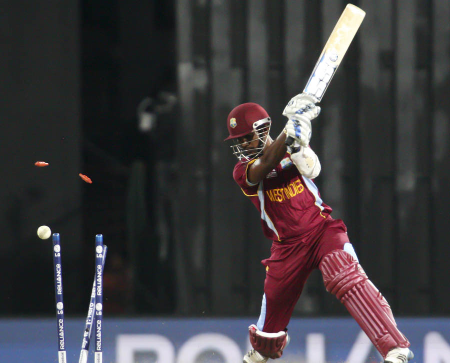 Denesh Ramdin of the West Indies gets bowled out
