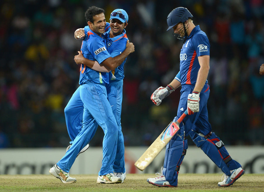 Irfan Pathan gets a hug from Suresh Raina after removing Luke Wright