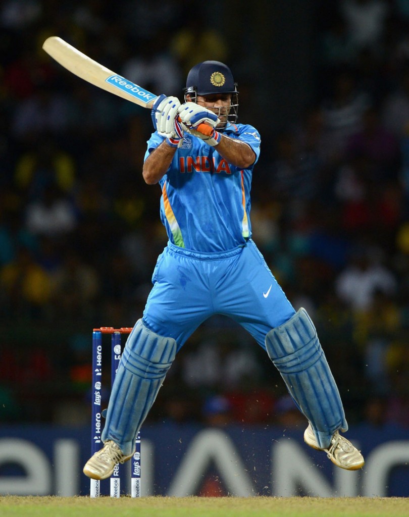 MS Dhoni attempts to pull off his helicopter shot