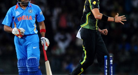 Mitchell Starc celebrates at knocking out Rohit Sharma's off stump