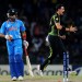 Mitchell Starc celebrates at knocking out Rohit Sharma's off stump