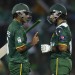 Pakistan's captain Mohammad Hafeez, left, talks to fellow batsman Imran Nazir