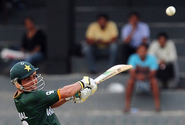 Pakistan cricketer Kamran Akmal plays a shot during a World Twenty20 warm-up match