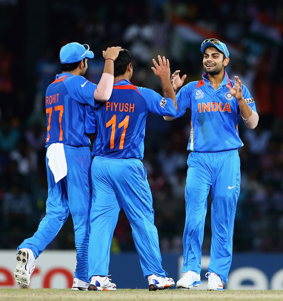 Piyush Chawla takes the plaudits from Rohit Sharma and Virat Kohli