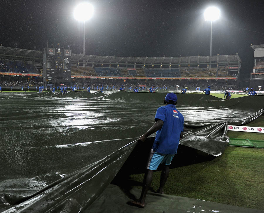 The covers are pulled on as rain stops play during the ICC World Twenty20 2012