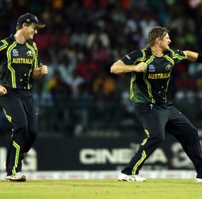 Shane Watson, right, celebrates the dismissal of West Indies' batsman Chris Gayle