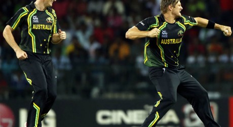 Shane Watson, right, celebrates the dismissal of West Indies' batsman Chris Gayle