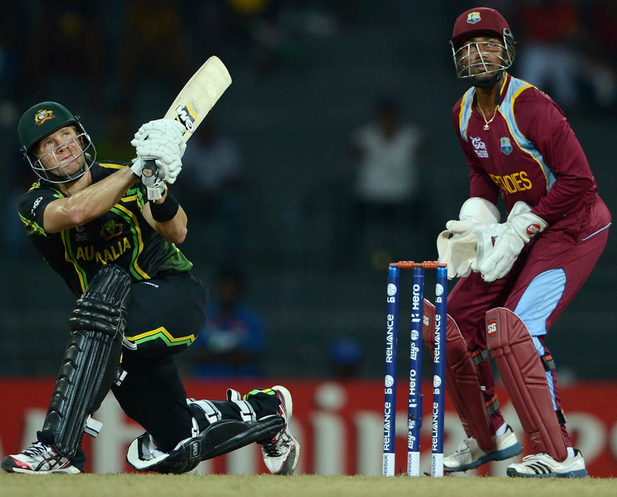 Shane Watson of Australia hits out for six runs
