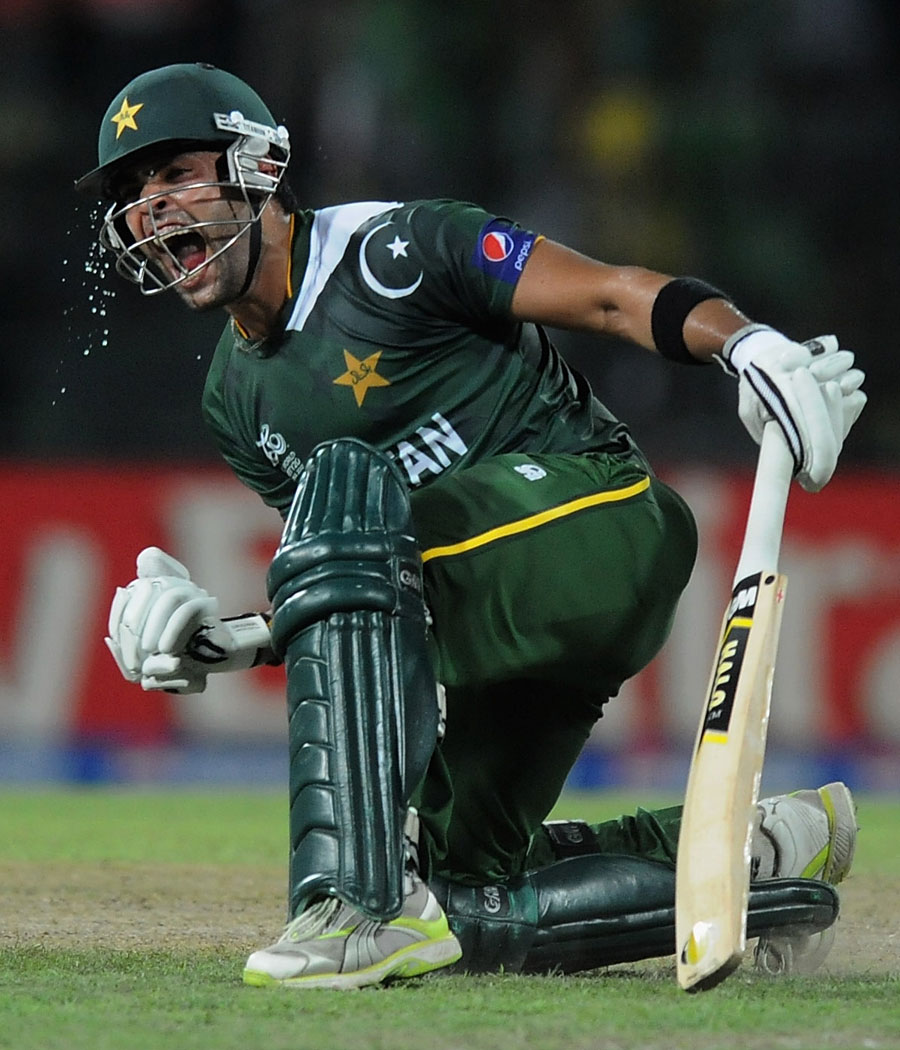 Umar Akmal celebrates a come-from-behind victory, Pakistan v South Africa