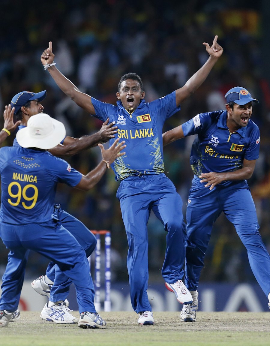 Sri Lanka's bowler Ajantha Mendis, second right celebrates the dismissal of West Indies's batsman Chris Gayle