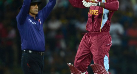Chris Gayle sets off in celebration as West Indies win the Super Over