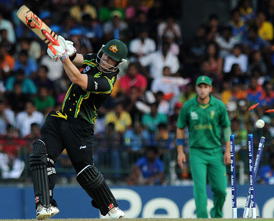 David Warner is bowled by South African cricketer Morne Morkel 