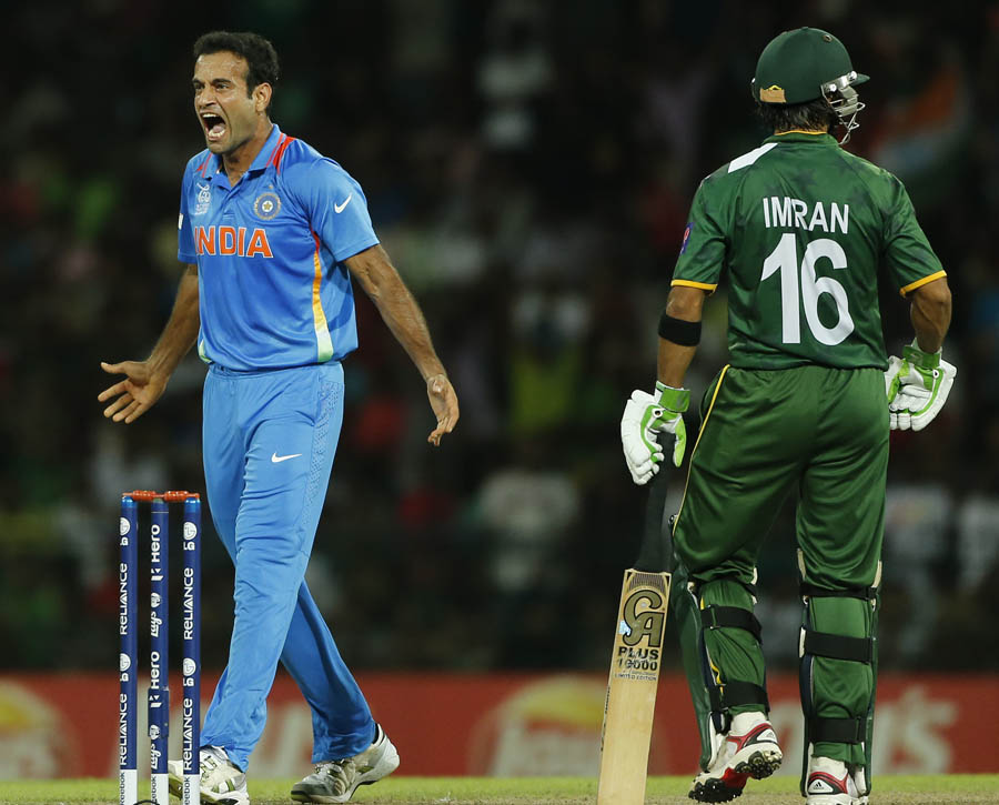 Irfan Pathan, center, reacts taking the wicket of Pakistan's batsman Imran Nazir