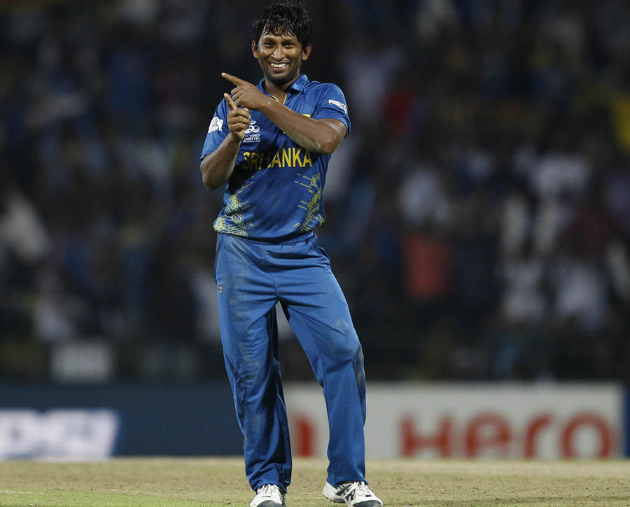 Jeevan Mendis dances to celebrate the dismissal of West Indies' batsman Dwayne Bravo