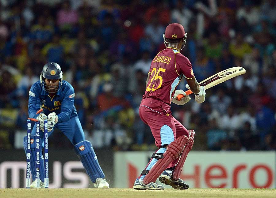 Johnson Charles is stumped by Kumar Sangakkara