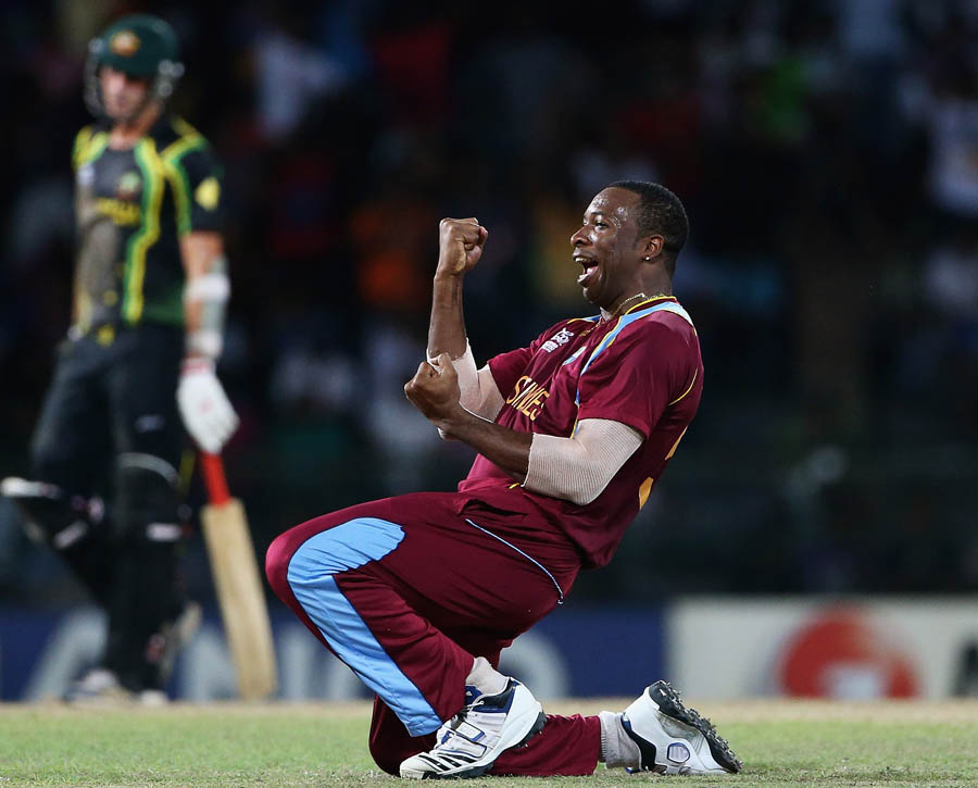 Kieron Pollard of the West INdies celebrates the wicket of George Bailey of Australia