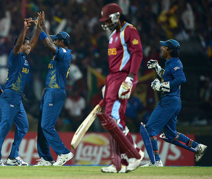 Nuwan Kulasekara celebrates the fall of Chris Gayle