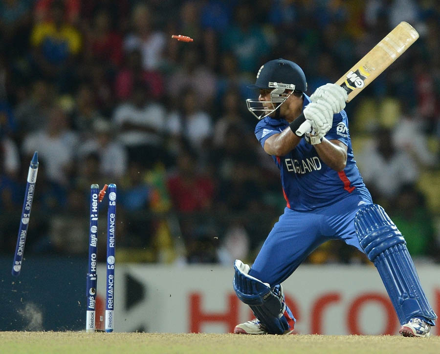 Samit Patel watches as his bails goes in air after being clean bowled by Sri Lanka's Lasith Malinga