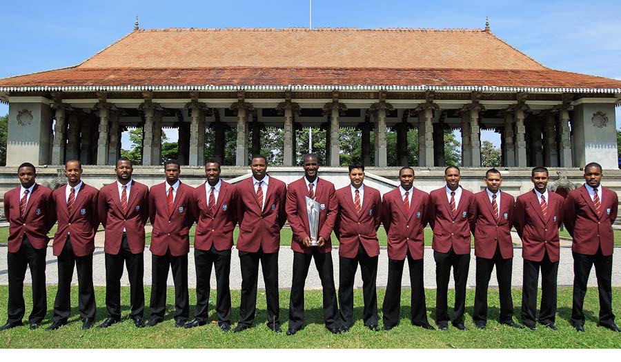 The West Indies Cricket Team pose for a photograph with the ICC World T20 Trophy at Independence Square