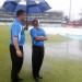 Umpires Adrian Holdstock and Shaun George take stock of the ground at Durban, South Africa v Pakistan