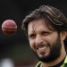 Pakistan's captain Afridi eyes a ball during a training session before their first cricket test match against Australia at Lord's cricket ground in London