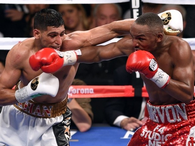 Amir Khan v Devon Alexander fight Pictures Amir Khan v Devon Alexander fight Pictures